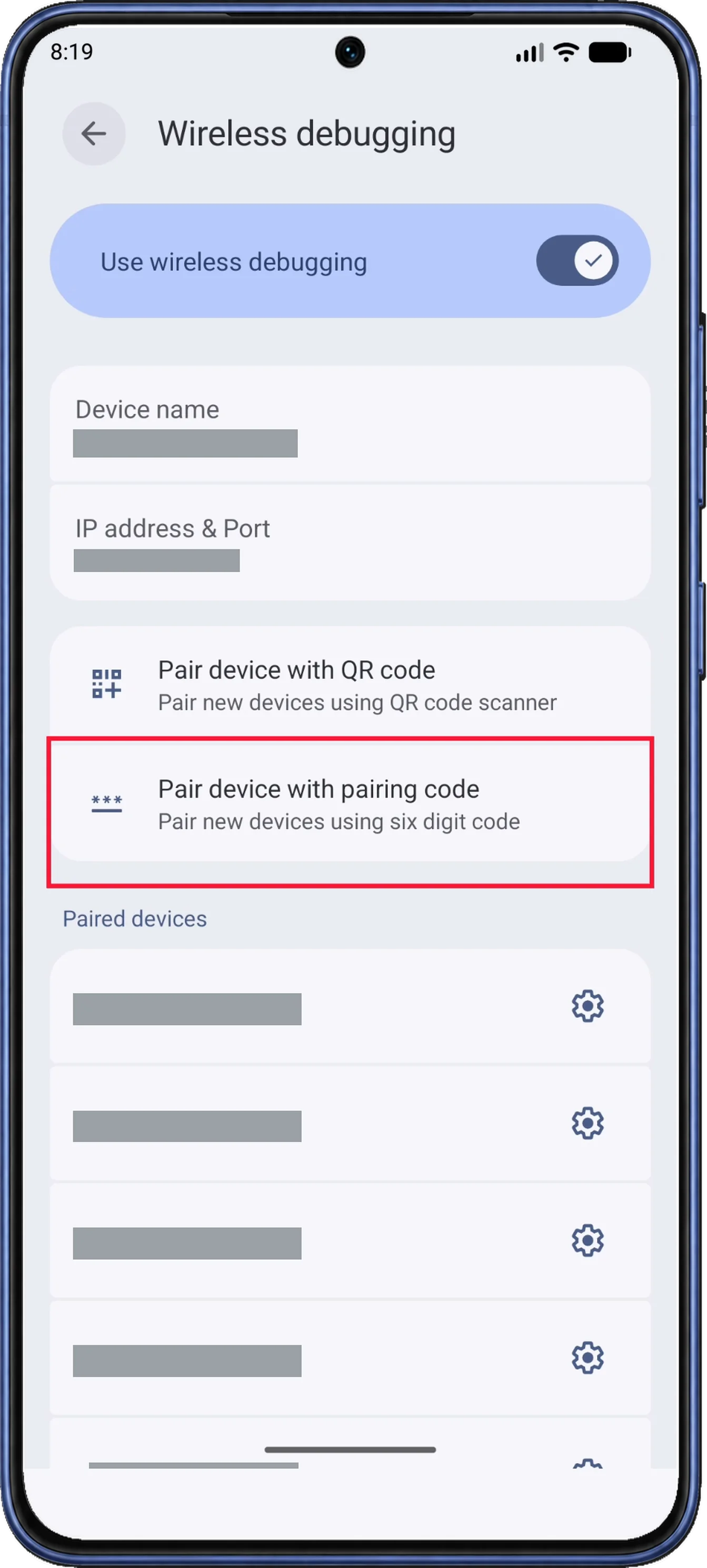 Wireless debugging shows Use wireless debugging enabled and Pair device with pairing code below the QR-code option.