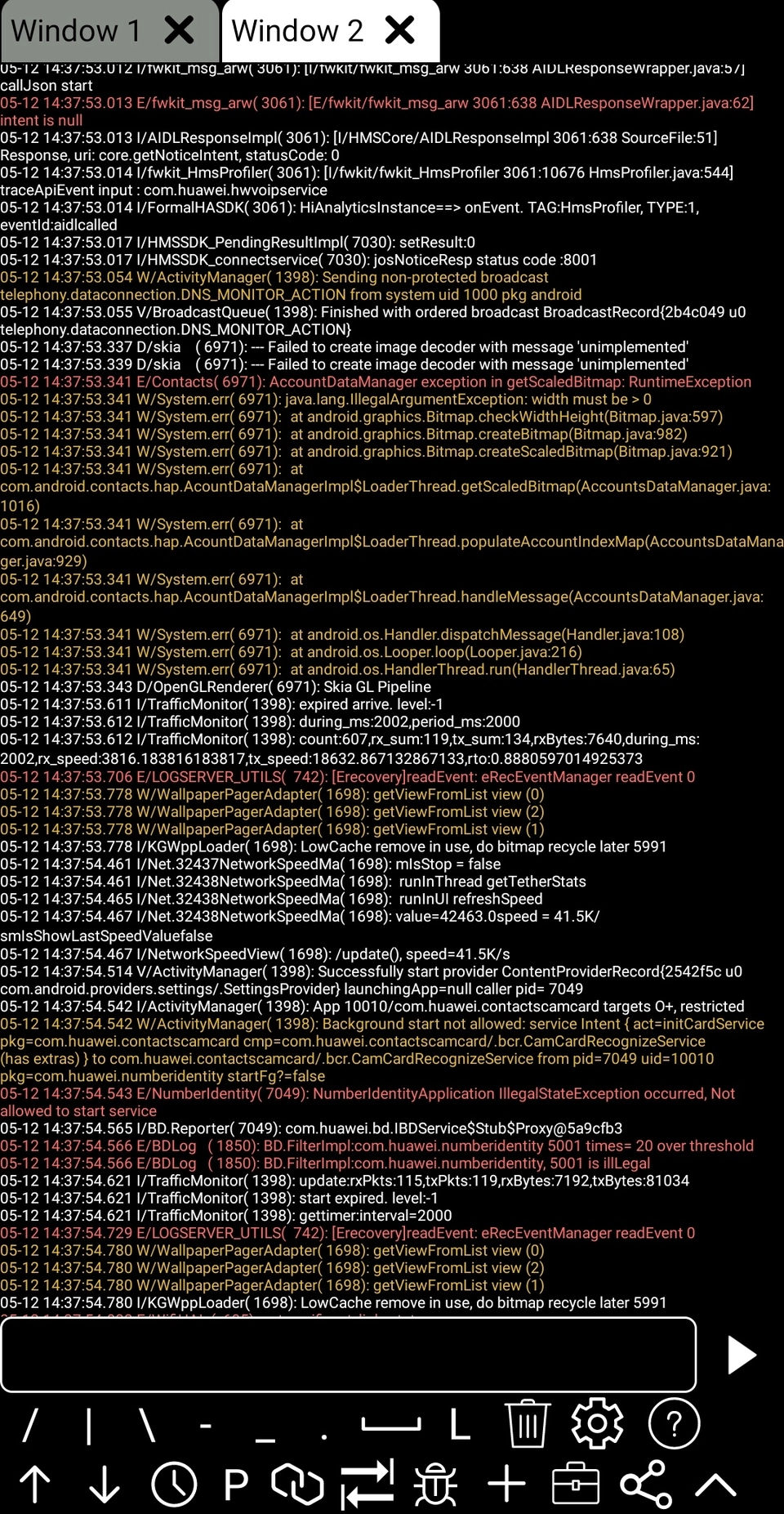 ADB Shell showing Logcat output in a second terminal window