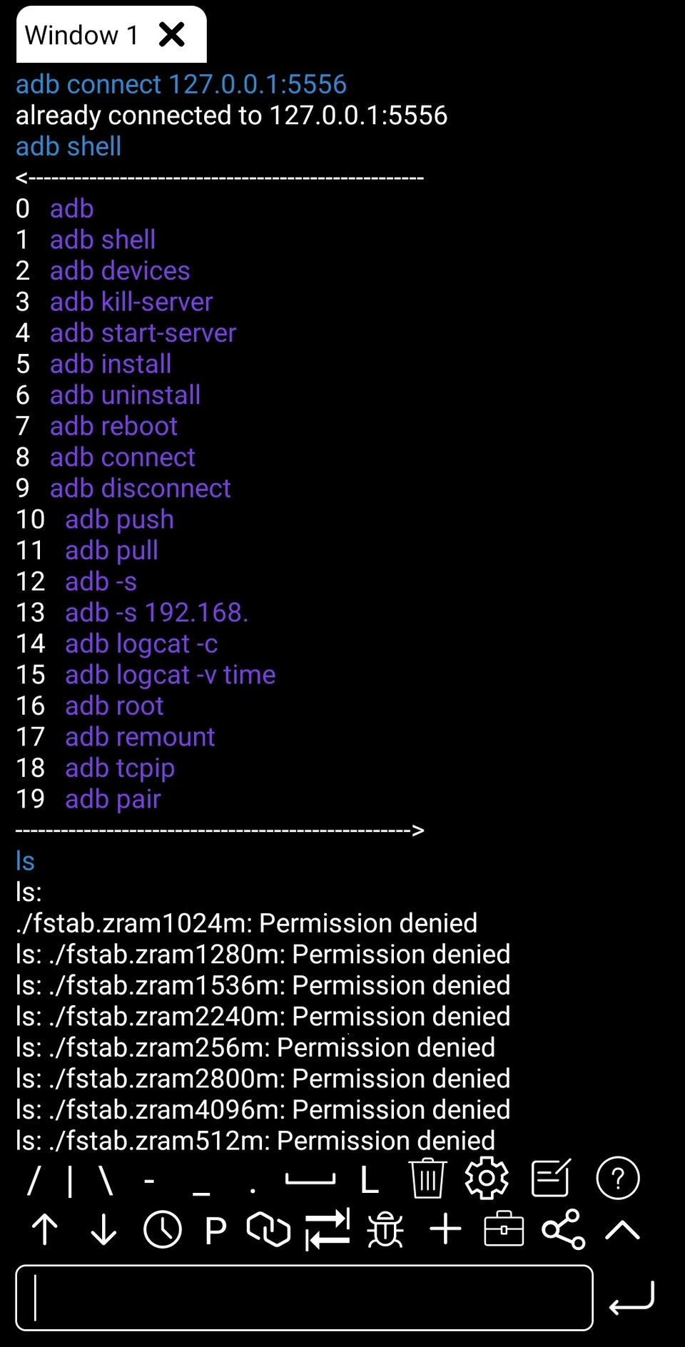 ADB Shell terminal showing commands, output, and its toolbar